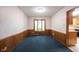 Formal dining room featuring a large bay window and access to the kitchen at 7115 Fremont Ct, Indianapolis, IN 46256