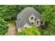 Sprawling home with a well-manicured lawn, mature trees, and a circular driveway, perfect for luxurious living at 7138 Nile Ridge Ct, Indianapolis, IN 46236