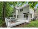 Enjoy outdoor living on this spacious deck with views of the lush green yard and mature trees at 7138 Nile Ridge Ct, Indianapolis, IN 46236