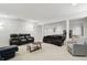 This finished basement features a comfortable seating area and space for recreation at 7138 Nile Ridge Ct, Indianapolis, IN 46236