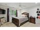 Cozy bedroom with natural light, wooden furniture and neutral tones for a relaxing atmosphere at 7138 Nile Ridge Ct, Indianapolis, IN 46236