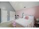 Bright bedroom features stylish decor, complemented by soft colors and natural light at 7138 Nile Ridge Ct, Indianapolis, IN 46236