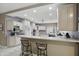 Well-equipped kitchen boasting plentiful counter space, a breakfast bar, and an efficient layout for cooking and socializing at 7138 Nile Ridge Ct, Indianapolis, IN 46236