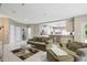 Open-concept living room leading to the kitchen with a tile floor and neutral-toned walls at 7138 Nile Ridge Ct, Indianapolis, IN 46236
