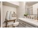 Well-lit bathroom with modern fixtures, shiplap walls, and stylish decor at 7207 Grouper Dr, Nineveh, IN 46164