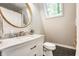 Bathroom featuring marble vanity and black tile flooring at 7207 Grouper Dr, Nineveh, IN 46164