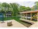 Picturesque boat dock with multiple boat slips on a lake at 7207 Grouper Dr, Nineveh, IN 46164