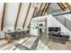 Open-concept living space featuring a dining area, kitchen, and high ceilings at 7207 Grouper Dr, Nineveh, IN 46164