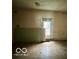 This bedroom has a window with a view and potential for updates at 721 Haugh St, Indianapolis, IN 46222