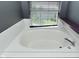 Close up of a large and luxurious bathtub at 7529 Oceanline Dr, Indianapolis, IN 46214