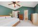 Bedroom with vaulted ceiling, closet, and an ensuite bathroom at 7742 Bayridge Dr, Indianapolis, IN 46236
