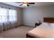 Bedroom with neutral carpet flooring and bright natural light from the window at 8370 State Road 236, North Salem, IN 46165