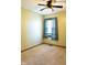 Cozy bedroom features carpeted floors, ceiling fan and window with curtains at 8370 State Road 236, North Salem, IN 46165