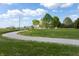 Spacious lot featuring a long driveway leading to a home surrounded by greenery at 8370 State Road 236, North Salem, IN 46165