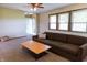 Living room features modern furniture, carpet flooring and lots of natural light at 8370 State Road 236, North Salem, IN 46165