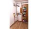 Well-organized utility room featuring a wall-mounted Bosch system and shelving at 8370 State Road 236, North Salem, IN 46165