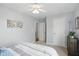 Cozy bedroom with soft natural light, ceiling fan, and neutral decor at 863 Lionshead Ln, Greenwood, IN 46143