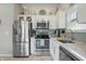 Well-equipped kitchen with stainless steel appliances, granite countertops, and ample storage at 863 Lionshead Ln, Greenwood, IN 46143