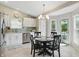 Lovely eat-in kitchen with stainless appliances and a door to the backyard at 863 Lionshead Ln, Greenwood, IN 46143