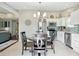 Bright eat-in kitchen with stainless steel appliances and light countertops at 863 Lionshead Ln, Greenwood, IN 46143