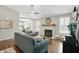 Inviting living room with a fireplace, hardwood floors, and stylish furniture at 863 Lionshead Ln, Greenwood, IN 46143