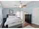 Comfortable main bedroom with ceiling fan, hardwood floors, and large dresser at 863 Lionshead Ln, Greenwood, IN 46143