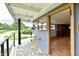 Cozy balcony with seating, opening into the interior of the home at 9080 W Forest Dr, Elwood, IN 46036