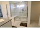 Contemporary bathroom featuring a glass-enclosed shower and a sleek countertop sink at 9640 Katana Cir, Fishers, IN 46040