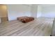 Spacious bedroom with wood floors, ample lighting, and neutral tones for a relaxing atmosphere at 9640 Katana Cir, Fishers, IN 46040