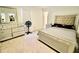 A bedroom with carpet and a modern bedroom set including a bed, dresser, and mirror at 9640 Katana Cir, Fishers, IN 46040