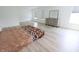 Bright bedroom with a stylish bed, modern dresser and lots of natural light from multiple windows at 9640 Katana Cir, Fishers, IN 46040