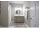 Bathroom featuring a vanity with a round mirror, and a shower with a curtain at 9743 Herons Cv, Carmel, IN 46280