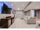 Finished basement offers a cozy living area with a large TV and comfortable seating at 10243 Brixton Ln, Fishers, IN 46037