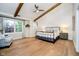 Bedroom featuring wood beams and chair at 10243 Brixton Ln, Fishers, IN 46037