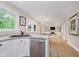 Open-concept kitchen flows into living room at 10243 Brixton Ln, Fishers, IN 46037