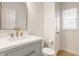 Bathroom with a modern vanity, white countertops, and a stylish gold-framed mirror at 10922 Liberation Trce, Noblesville, IN 46060