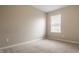 Bright bedroom featuring one window with blinds and neutral carpet at 10922 Liberation Trce, Noblesville, IN 46060