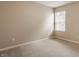 Bright bedroom featuring one window with blinds and neutral carpet at 10922 Liberation Trce, Noblesville, IN 46060