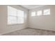 Bright bedroom featuring one window with blinds and neutral carpet at 10922 Liberation Trce, Noblesville, IN 46060
