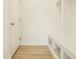 Well-lit mudroom features built-in storage and bench, providing a practical and organized entryway at 10922 Liberation Trce, Noblesville, IN 46060