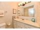 This secondary bathroom offers a built-in vanity and medicine cabinet at 1102 Fox Hill Dr, Indianapolis, IN 46228