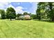 Yard offers plenty of space for outdoor activities at 1102 Fox Hill Dr, Indianapolis, IN 46228