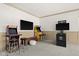 Arcade area with vintage video game consoles and comfortable seating at 11101 Hawthorn Rdg, Fishers, IN 46037