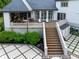 Spacious backyard with an outdoor kitchen, dining, and lounge area at 11101 Hawthorn Rdg, Fishers, IN 46037