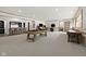 Spacious basement with carpeting, kitchenette, pool table, shuffleboard, and arcade games at 11101 Hawthorn Rdg, Fishers, IN 46037
