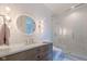Stylish bathroom with a glass-enclosed shower, modern fixtures, and a sleek vanity at 11101 Hawthorn Rdg, Fishers, IN 46037