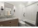 Modern bathroom featuring subway tile, a stylish vanity, and a shower-tub combination at 11101 Hawthorn Rdg, Fishers, IN 46037