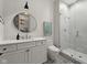 Stylish bathroom featuring tile flooring, modern toilet, glass shower, sink and vanity at 11101 Hawthorn Rdg, Fishers, IN 46037