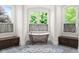 Bathroom showcasing an elegant soaking tub with a garden view at 11101 Hawthorn Rdg, Fishers, IN 46037