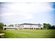 Expansive clubhouse with covered verandas, perfect for social gatherings and overlooking the lush golf course at 11101 Hawthorn Rdg, Fishers, IN 46037
